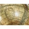 Image 2 : An early 19th Century miniature terrestrial globe on an ebonised stand, 6.5cm diameter, inscri...