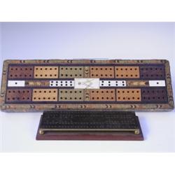 A l9th Century Tunbridge ware cribbage board the centre with an ivory plaque with an engraved...