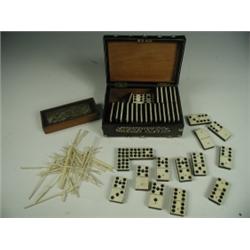 A set of 55 bone dominoes numbers '9' down, with ebony backing and a set of ivory spellicans i...