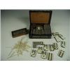 Image 1 : A set of 55 bone dominoes numbers '9' down, with ebony backing and a set of ivory spellicans i...