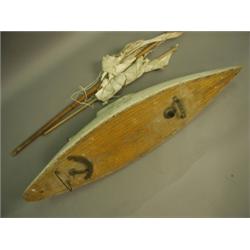 A 1920's painted wooden pond yacht, with mast, 96cm long Est. 200/300...