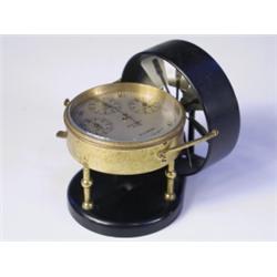 A 20th Century anemometer by Casella, London, the silvered dial numbered H32236, in a fitted m...