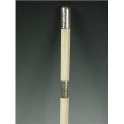 An ivory conductors baton with three white metal collars and a presentation inscription dated...