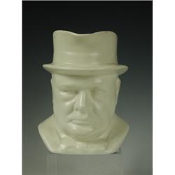 A Winston Churchill character jug with printed mark '1941 Winston Churchill modelled by Frank...