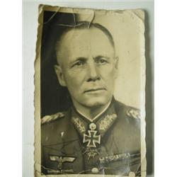 Two signed postcards and 1 photograph One of General Rommel, bears signature (?) Two of a stun...