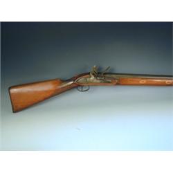A 19th Century flintlock fowling piece, 59" barrel, together with a ramrod Est. 300/500...