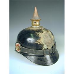 A Saxon World War I metal Pickelhaube Est. 150/250...