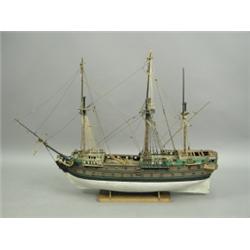 A model of a Man O War, with two gun decks and three masts, complete with rigging. 100cm long...