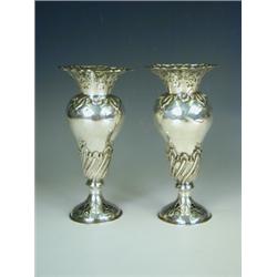 A pair of Edwardian silver vases with pierced borders and spiral repousse decoration, Sheffiel...