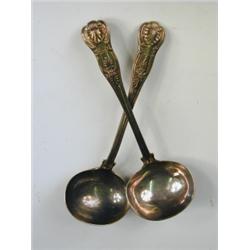 A pair of Victorian Kings pattern silver sauce ladles, makers mark W.E., London, 1835, 19cm<br...