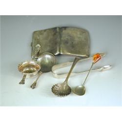 Various items: a pair of Victorian silver sugar tongs, London 1844, a sterling silver tea stra...
