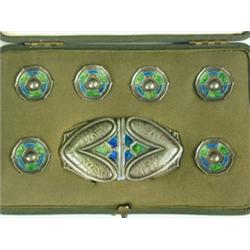 A Liberty's Cymric silver buckle and 6 hexagonal buttons, each with green and blue enamel, mar...