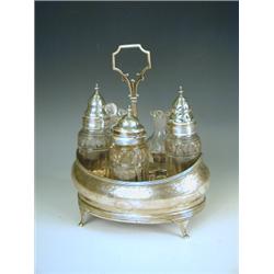 A George III silver cruet of boat shape with bright cut decoration, a wooden base and five mat...