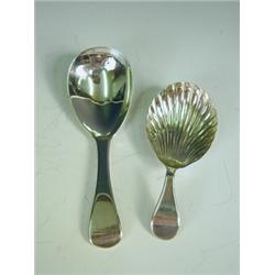 Two Regency silver caddy spoons, the first of plain form, makers mark WB, London 1817, the oth...