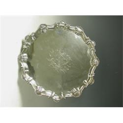 A George III silver salver with an engraved armorial, raised on 3 feet, maker Ebenezer Coker,...