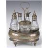 Image 1 : A George III silver bottle cruet stand, each piece struck London 1806, makers initials 'C.C.',...