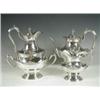 Image 1 : A silver four piece teaset, comprising teapot, hot water and milk jug and twin handled sugar,...
