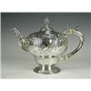 Image 1 : An early George III melon shape teapot with later Victorian floral repousse decoration, 24oz L...
