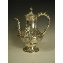 A Victorian silver coffee pot, the body repousse decorated with scrolling foliage, Glasgow 185...