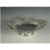 Image 1 : An Edwardian pierced silver basket, of shaped oval form, on a low foot, London, 1907 Est. 150/...