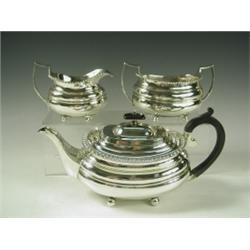 A George V silver 3 piece tea set in the George III style, Sheffield, 1927, maker William Hutt...
