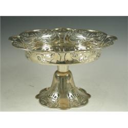 An early Edwardian silver cakestand having a pierced rim and foot, Birmingham 1905 Est. 120/18...