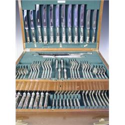 A modern silver canteen of cutlery in double struck Kings pattern. 8 place settings with carvi...