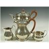 Image 1 : An Art Deco four piece silver tea service hallmarked London 1931, retailed by Harrods, 58ozs,...