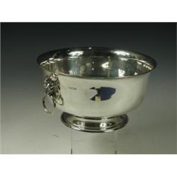 A silver rosebowl of plain pedestal shape with lions mask ring handles. 1867, approx 40oz, 27c...
