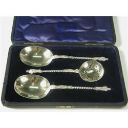 A cased set of three silver apostle spoons with gilt bowls and twist turned handles, London, 1...