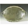 Image 1 : A large Victorian silver plated 2 handled tray on 4 scrolling feet, 61cm diameter excluding ha...
