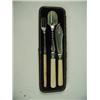 Image 1 : A cased three piece set comprising: fish knife, stilton scoop and pickle fork, with plated bla...