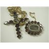 Image 1 : Two Victorian garnet set items: a cross pendant, 5cm long on a rope chain and a brooch also se...