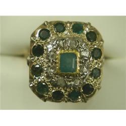 An emerald and diamond cluster ring, size L Est. 150/200...