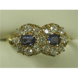 A sapphire and diamond cluster ring, hallmarked 18ct gold, Chester 1909, size R Est. 400/600...