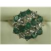 Image 1 : An emerald and diamond cluster ring set in 18ct white gold, size L Est. 400/500...