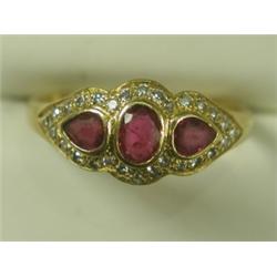 An 18ct gold ruby and diamond dress ring, size P Est. 140/160...