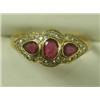 Image 1 : An 18ct gold ruby and diamond dress ring, size P Est. 140/160...