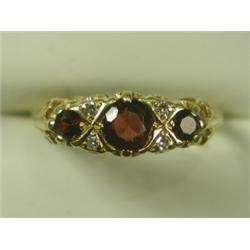 An Asprey & Co. 18ct gold garnet and diamond 1/2 hoop ring, size L Est. 120/160...