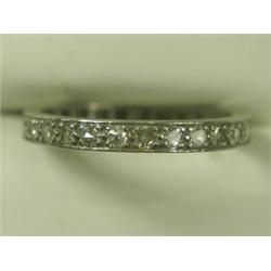 A diamond eternity ring, set with 27 8-cut stones, set in platinum, size N Est. 150/250...
