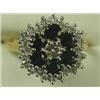 Image 1 : A sapphire and diamond cluster ring, set in 18ct gold, size O 1/2 Est. 550/650...