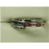 Image 1 : A triple eternity ring, the cental band half channel set with rubies, half with sapphires with...