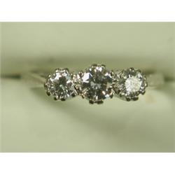 A 3-stone diamond ring set in 18ct white gold, sizes N Est. 200/300...
