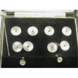 An Edwardian 18ct gold mother of pearl and diamond dress set consisting of a pair of cufflinks...