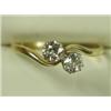 Image 1 : A 2-stone diamond crossover ring set with old cut stones in 18ct gold and platinum, size Q 1/2...