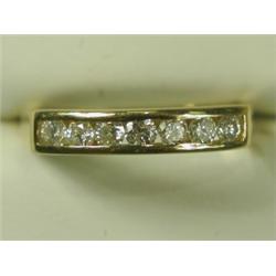 A diamond half eternity ring set in 18ct gold, size O Est. 300/400...