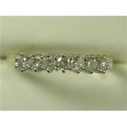 A diamond half eternity ring set in 18ct gold, size P Est. 150/200...