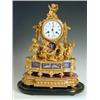 Image 1 : A Victorian bronze mantel clock with a burnished and matt gilt finish and porcelain panels. Th...