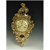 Image 1 : A 20th Century carved giltwood cartel clock with scrolled decoration and a striking movement,...