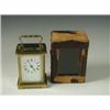 Image 1 : A brass carriage time piece with an enamel dial, key and travelling case, case in poor conditi...